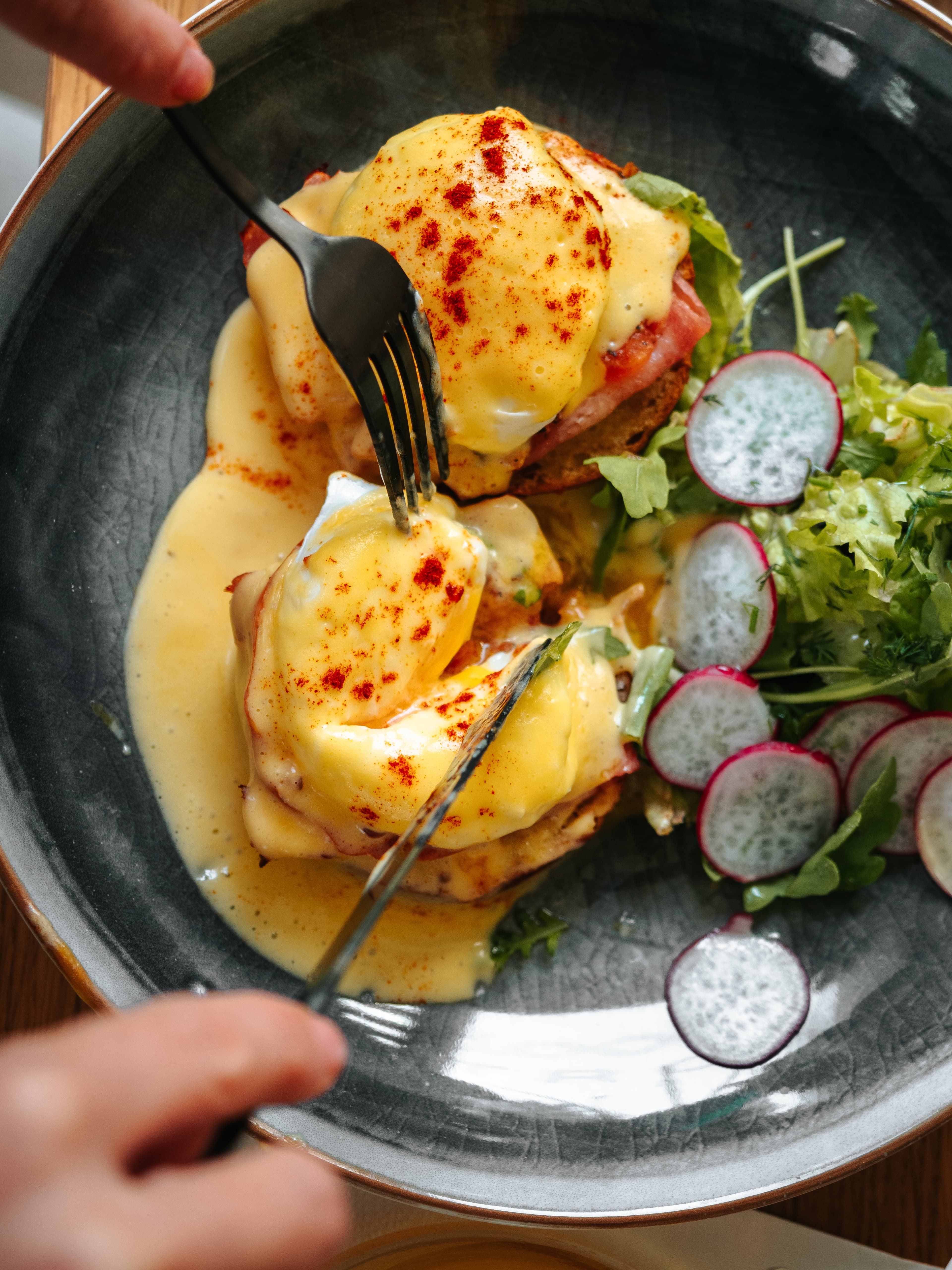 Close-up of eggs benedict with hollandaise